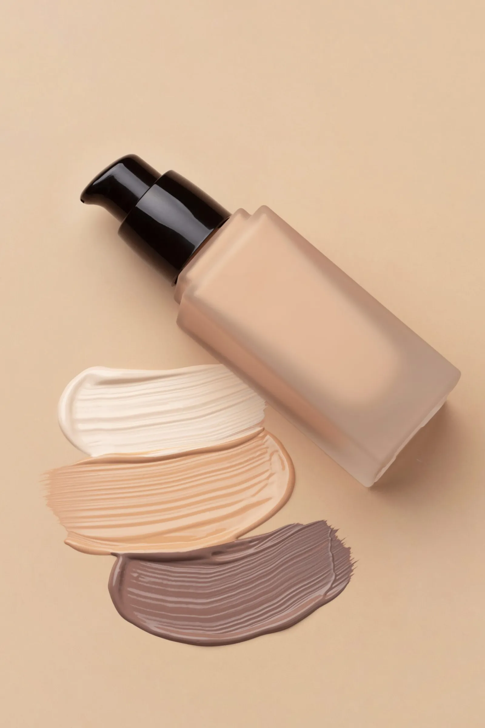 Foundation-Flasche mit Farbtexturen